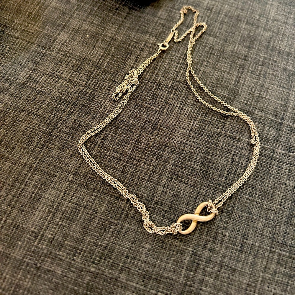 Tiffany infinity necklace . Comes with dust bag.